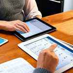 **

A person sitting at a kitchen table, reviewing finances using a budgeting app on a tablet. Around them are bills, a calculator, and a notebook. The scene conveys a sense of taking control of their financial future. Consider a warm, inviting kitchen setting typical of a German home.
*(Keywords: budgeting, finance, tablet, home, kitchen, control, German home)*

**